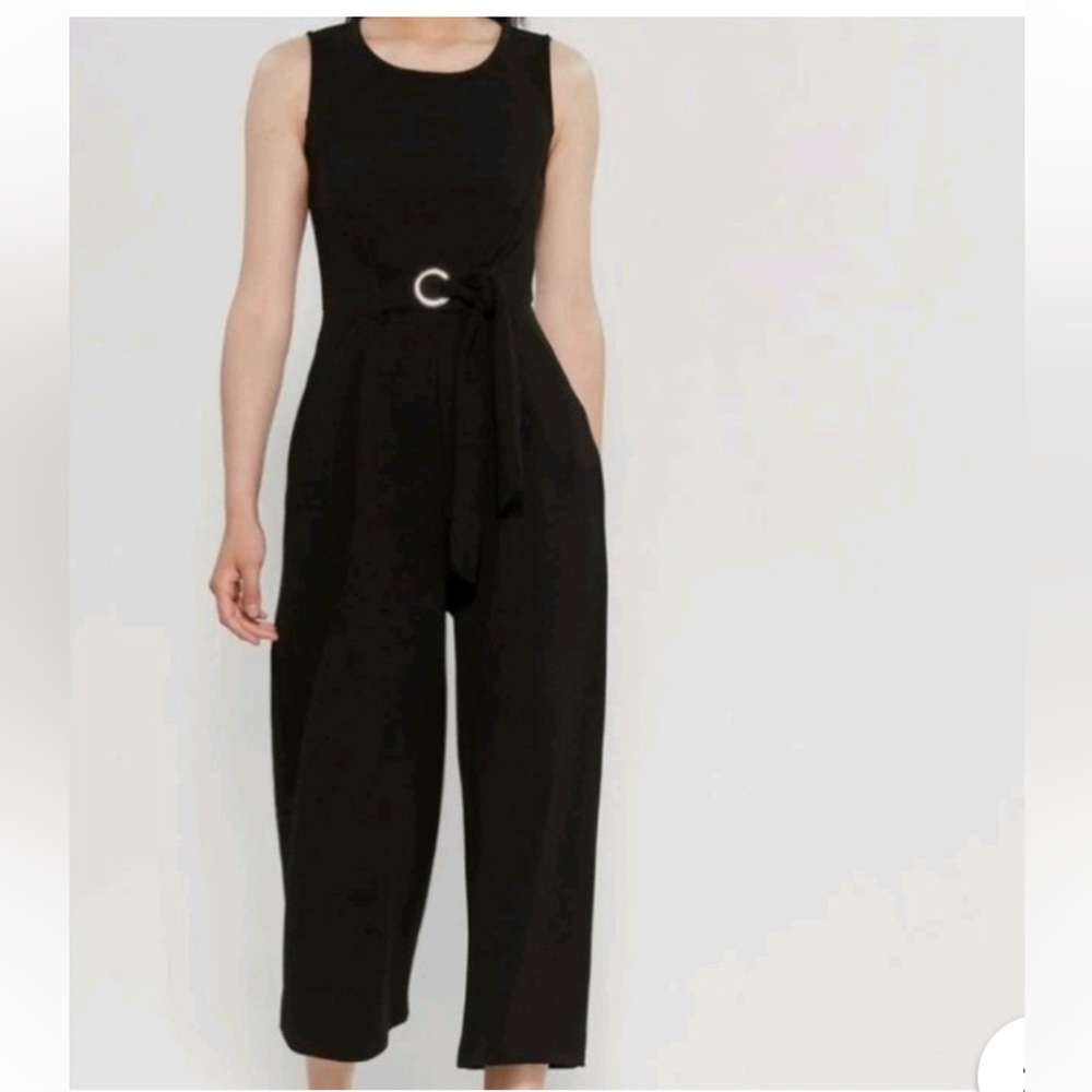 Chic Black Sleeveless Jumpsuit with Pockets!